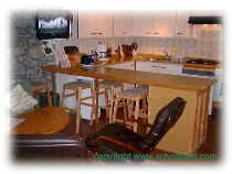 Ailanbeg Cottage Ferienhaus --- Wohnzimmer-K�chenzeile --- Klicken Sie dieses Bild um ein grosses Photo zu sehen
